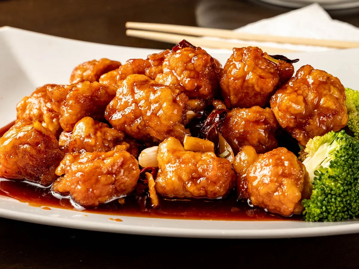 Braised spicy crispy chicken chunks with rich glossy sauce at Home Flavor, a Chinese Restaurant in Largo