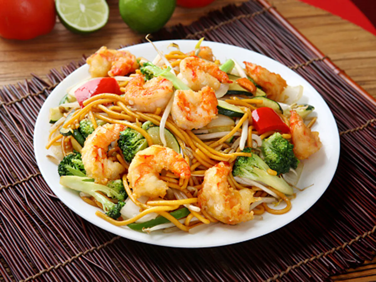 Stir-fried golden egg noodles with plump shrimp and mixed vegetables at Home Flavor, a Chinese Restaurant in Largo